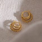 Twisted Triple Hoops